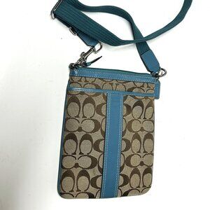 COACH classic signature Jacquard swingpack with blue leather trim/details